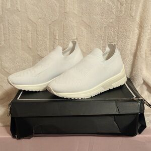 White Slip-On Sneakers